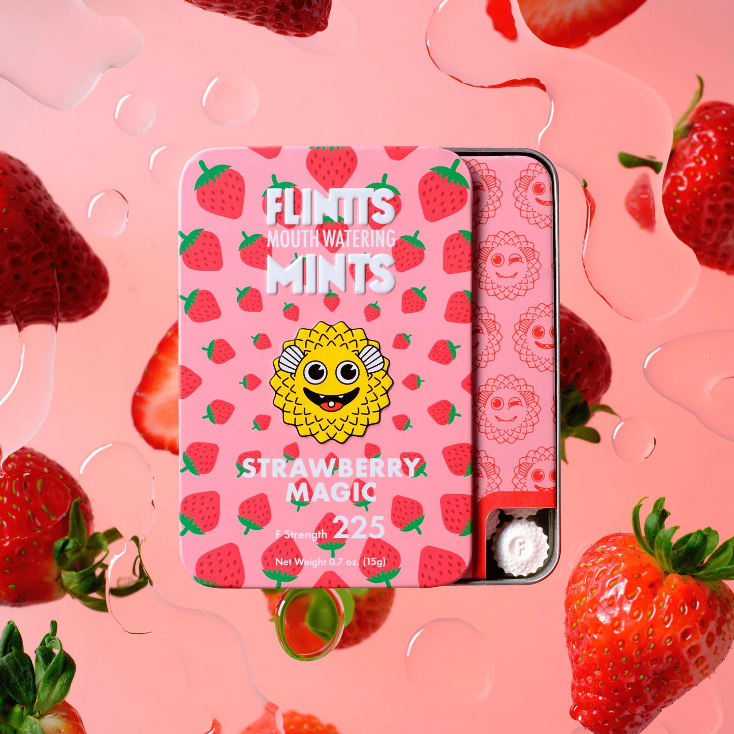 Flintts Mints Strawberry Magic F225 tin on a pink strawberry background – GetMints Australia